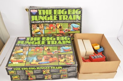 Lot 746 - Large collection of Tri-ang Big Big 0 Gauge including Locomotive wagons, Barrel Loads and other items, in three Jungle Train Set boxes