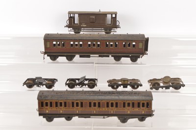 Lot 751 - Bassett-Lowke and Leeds 0 Gauge Coaches Wagons and spare bogies (5)