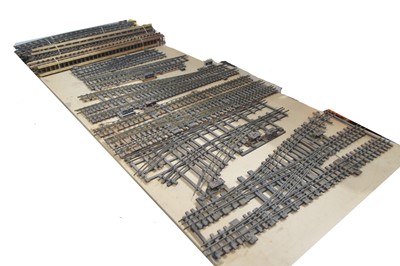 Lot 755 - Quantity of Bassett-Lowke and possibly other manufacturers 0 Gauge wooden sleeper 3 Rail Curved and Straight Track and six double Crossovers/Junctions (29)