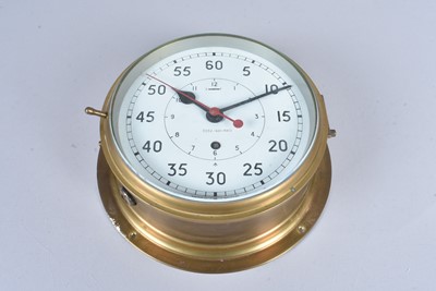 Lot 447 - A WWII Period Naval brass bulkhead clock