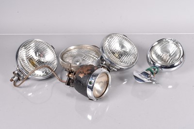 Lot 518 - A group of five Lucas Automotive lights/lamps