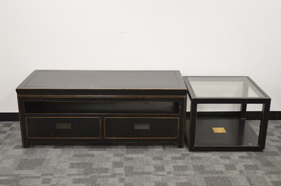 Lot 400 - A modern black lacquer low television cabinet, with two draws