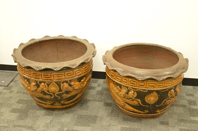 Lot 360 - A pair of large and impressive dragon designed plant pots