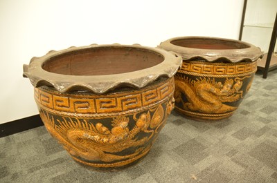 Lot 360 - A pair of large and impressive dragon designed plant pots