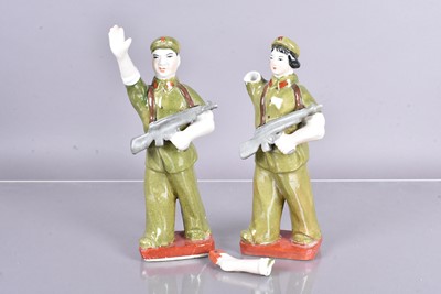 Lot 575 - Two Red Army pottery figures