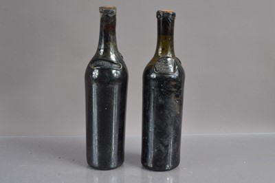 Lot 110 - Two extremely rare hand-blown double-sealed French 'cylinder' wine bottles corked with contents c.1860