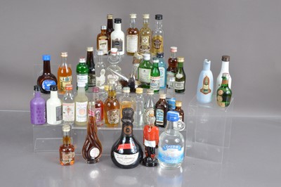 Lot 202 - A large collection of miniature spirit bottles etc