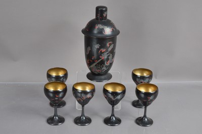 Lot 238 - A Chinese lacquer Art Deco era cocktail set with a cocktail shaker and six matching goblets