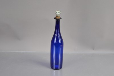 Lot 239 - A 'Bristol Blue' glass bottle-shape decanter with silver plated 'Brandy' label stopper