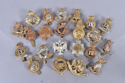 Lot 714 - An assortment of Dragoon Guards and Hussars cap badges