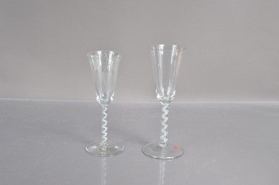 Lot 249 - Two late Georgian glass ale drinking glasses