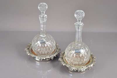 Lot 253 - A pair of Victorian Elkington & Co silver plated magnum bottle coasters