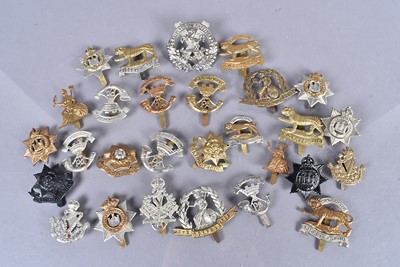 Lot 715 - An assortment of British Cap Badges