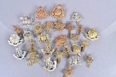 Lot 716 - A selection of Victorian and later British Cap badges