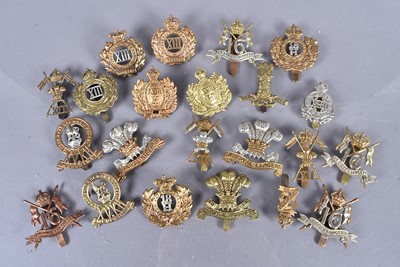 Lot 720 - A collection of Hussars cap badges