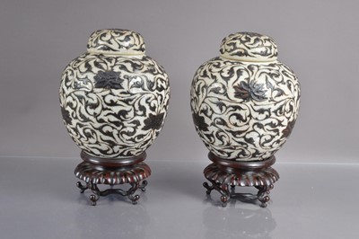 Lot 326 - A pair of 19th Century crackle glaze jars and covers