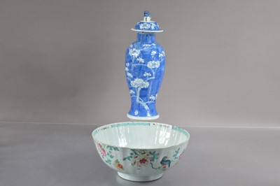 Lot 329 - A Chinese Qin dynasty famille rose bowl with fluted sides decorated with birds and peonies