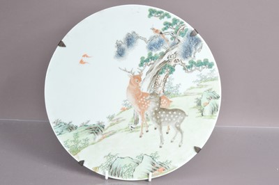 Lot 335 - A Chinese Qing dynasty famille rose porcelain wall plaque
