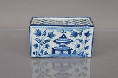 Lot 367 - A Delft style blue and white pottery flower brick