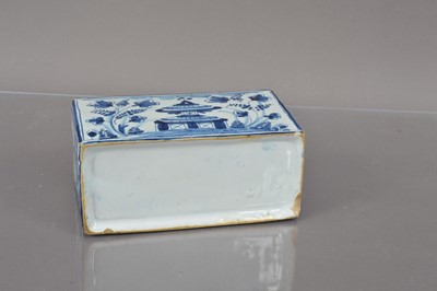 Lot 367 - A Delft style blue and white pottery flower brick