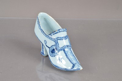Lot 379 - An 18th Century style blue and white Delftware shoe
