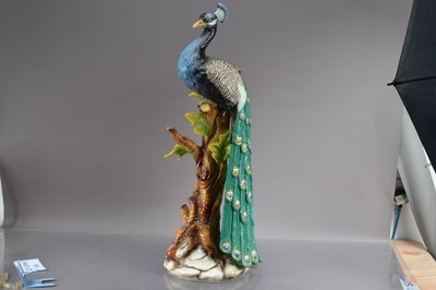 Lot 389 - A very large mid-20th Century pottery model of a peacock