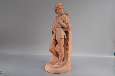 Lot 394 - A Victorian Watcombe Pottery moulded terracotta statue of the young "Dick Whittington"