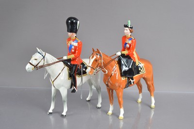 Lot 399 - A pair of Beswick commemorative equestrian chines figurines of HRH Queen Elizabeth II and HRH The Duke of Edinburgh