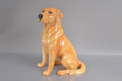 Lot 406 - A large 'Fireside' size Beswick model of a seated Golden Labrador Retriever