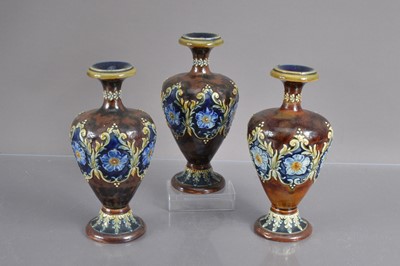 Lot 410 - A trio of Doulton Lambeth  stoneware vases