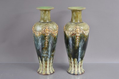 Lot 411 - A pair of Royal Doulton Lambethware green glazed Art Nouveau stoneware vases circa 1900