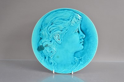 Lot 413 - A Burmantofts art pottery turquoise glazed earthenware pottery relief portrait wall plaque