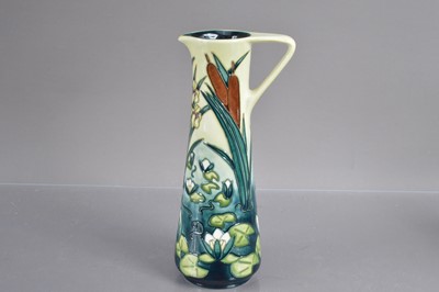 Lot 422 - A Moorcroft Pottery "Lamia" pattern trial ewer shape vase dated '95