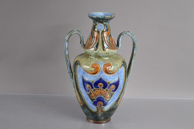 Lot 427 - A Royal Doulton Frank A Butler (fl1872-1911) Art Nouveau style two handled ewer