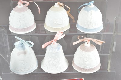 Lot 436 - A collection of twenty Lladro Christmas collector's bells and baubles
