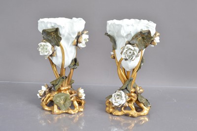 Lot 458 - A pair of Moore Brothers vases in the form of lotus flowers