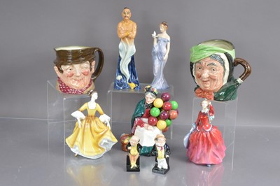 Lot 460 - A group of nine Royal Doulton figurines and character jugs