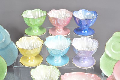 Lot 488 - A set of  seven Maling art deco period harlequin lustre glaze sundae dishes