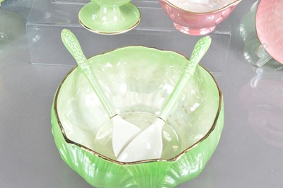 Lot 488 - A set of  seven Maling art deco period harlequin lustre glaze sundae dishes