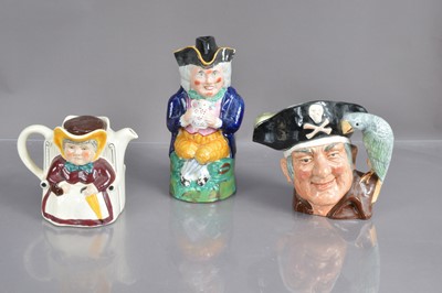 Lot 534 - An old Staffordshire 'Toby Jug' retaining its original hat lid