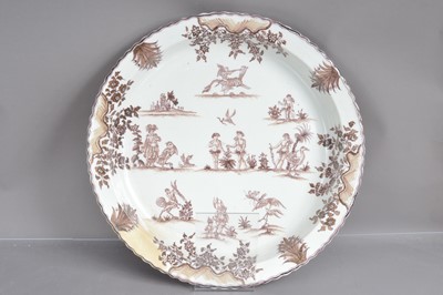 Lot 539 - A very large French faience charger in the Moustiers 18th Century style