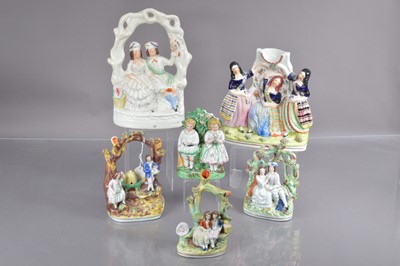 Lot 551 - Six Staffordshire flat back figure groups