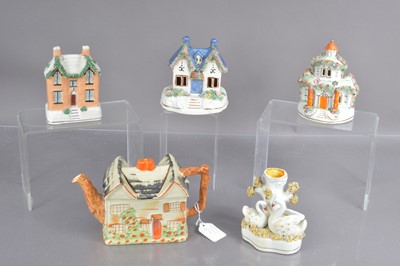 Lot 555 - Five Staffordshire pottery items