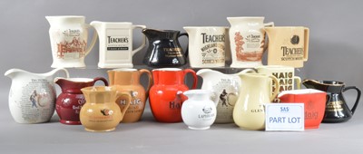 Lot 60 - A large collection of ceramic water jugs
