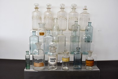 Lot 160 - A group of five glass Chemist bottles