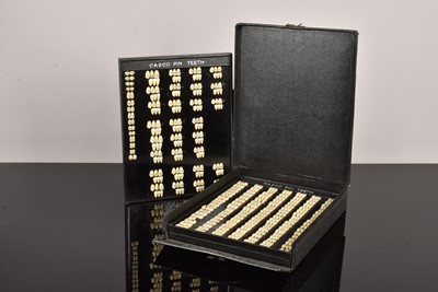 Lot 191 - A Casco Pin Teeth set by Claudius Ash