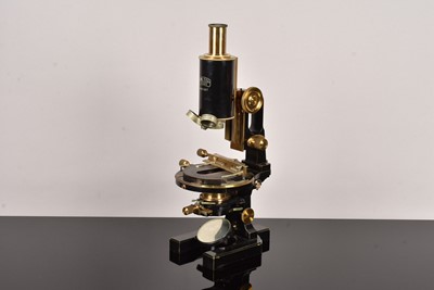 Lot 274 - A Mid 20th Century black lacquered and brass Carl Zeiss 'Jug-Handle' Monocular Microscope