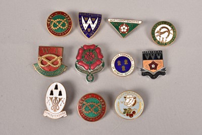 Lot 282 - An assortment of Women's Institute enamel pin badges