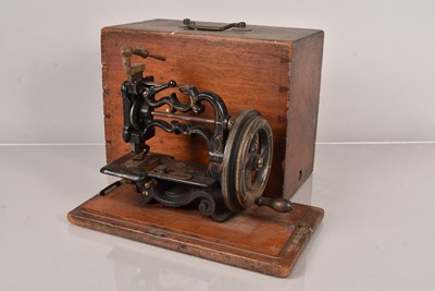 Lot 329 - A 19th Century Jag Weir small table top hand crank sewing machine