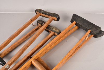 Lot 331 - Two pairs of Vintage wooden medical crutches